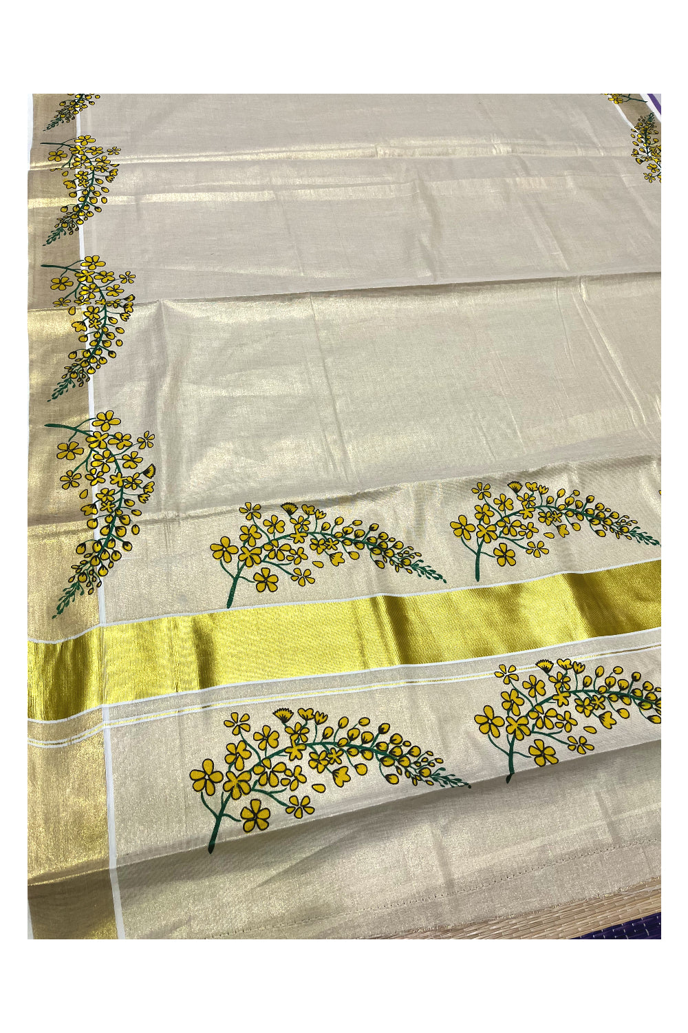 Kerala Tissue Kasavu Saree with Floral Prints on Body