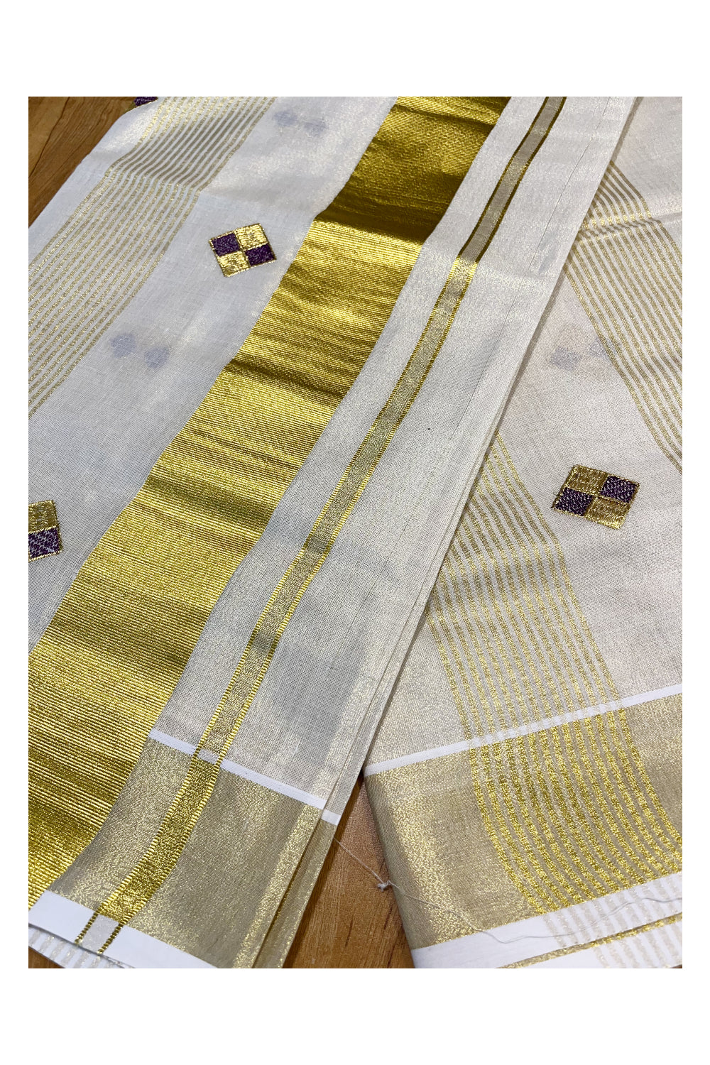 Kerala Tissue Kasavu Stripes Saree with Violet and Golden Diagonal Floral Embroidery Design on Body