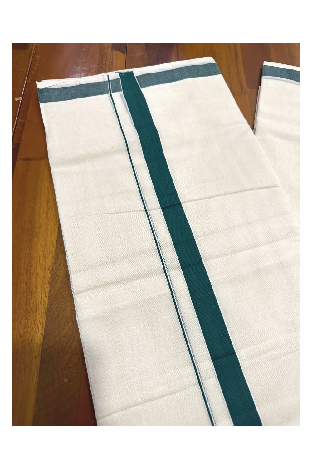 Southloom Premium Handloom Mundu with Green Kara (Onam Mundu 2023)