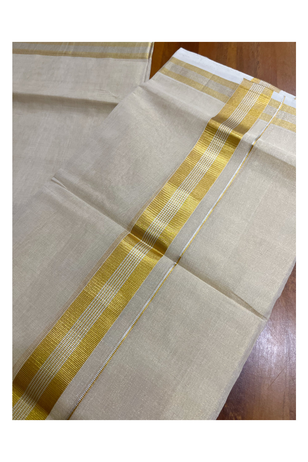 Southloom Premium Handloom Tissue Mundu with 2 inch Kasavu Border with Silver Woven Work