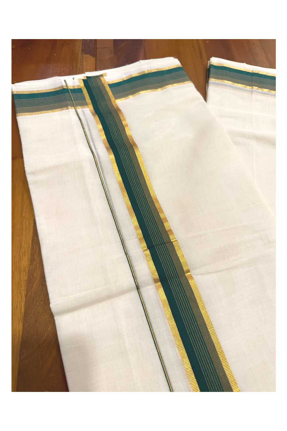 Southloom Premium Handloom Mundu with Green and Kasavu Kara (Onam Mundu 2023)