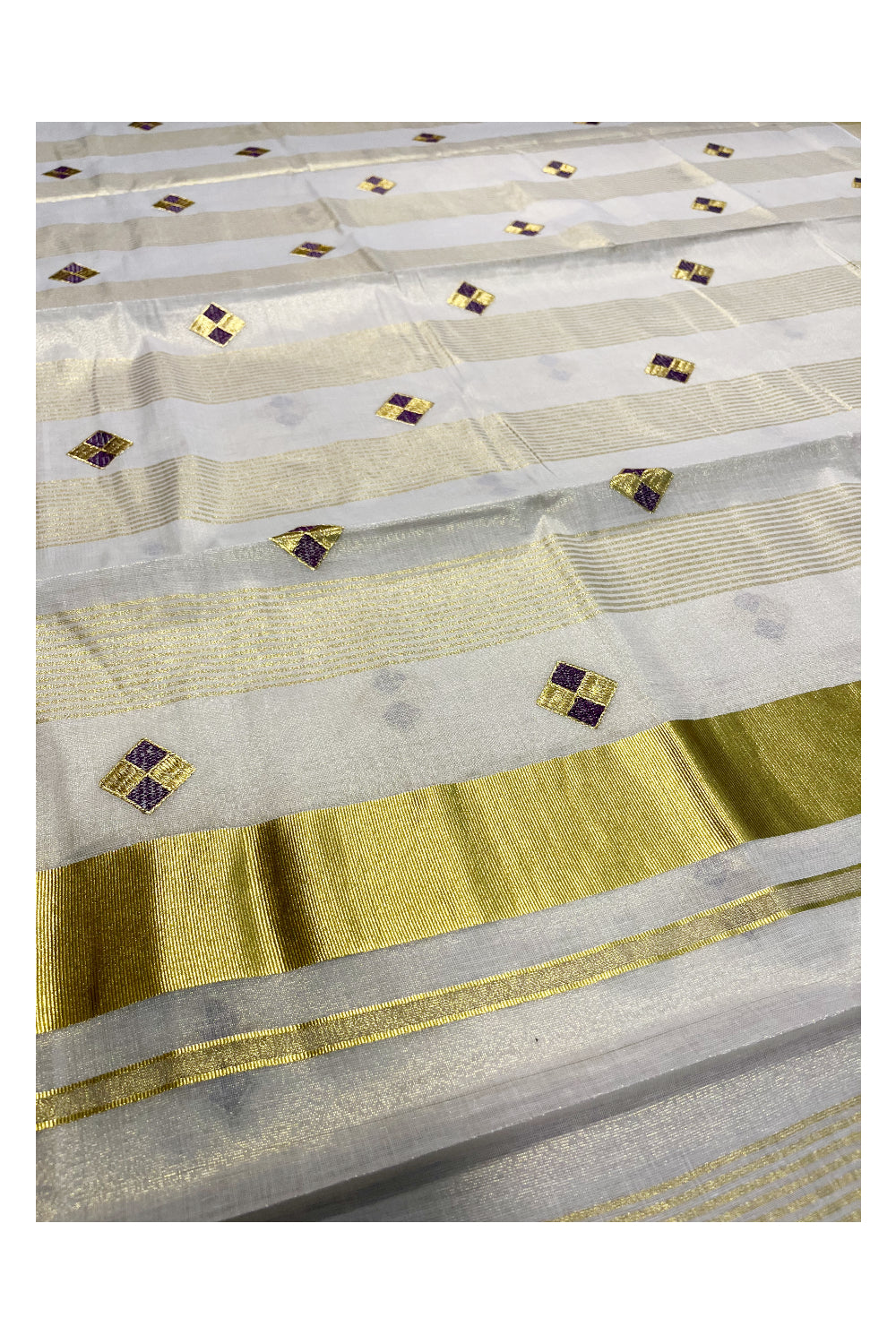 Kerala Tissue Kasavu Stripes Saree with Violet and Golden Diagonal Floral Embroidery Design on Body