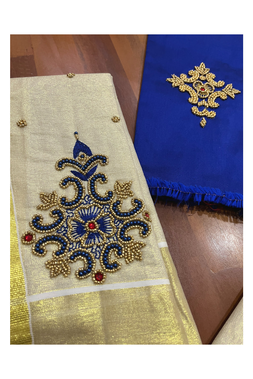 Kerala Tissue Kasavu Set Mundu (Mundum Neriyathum) with Bead Handwork Design and Blue Blouse Piece