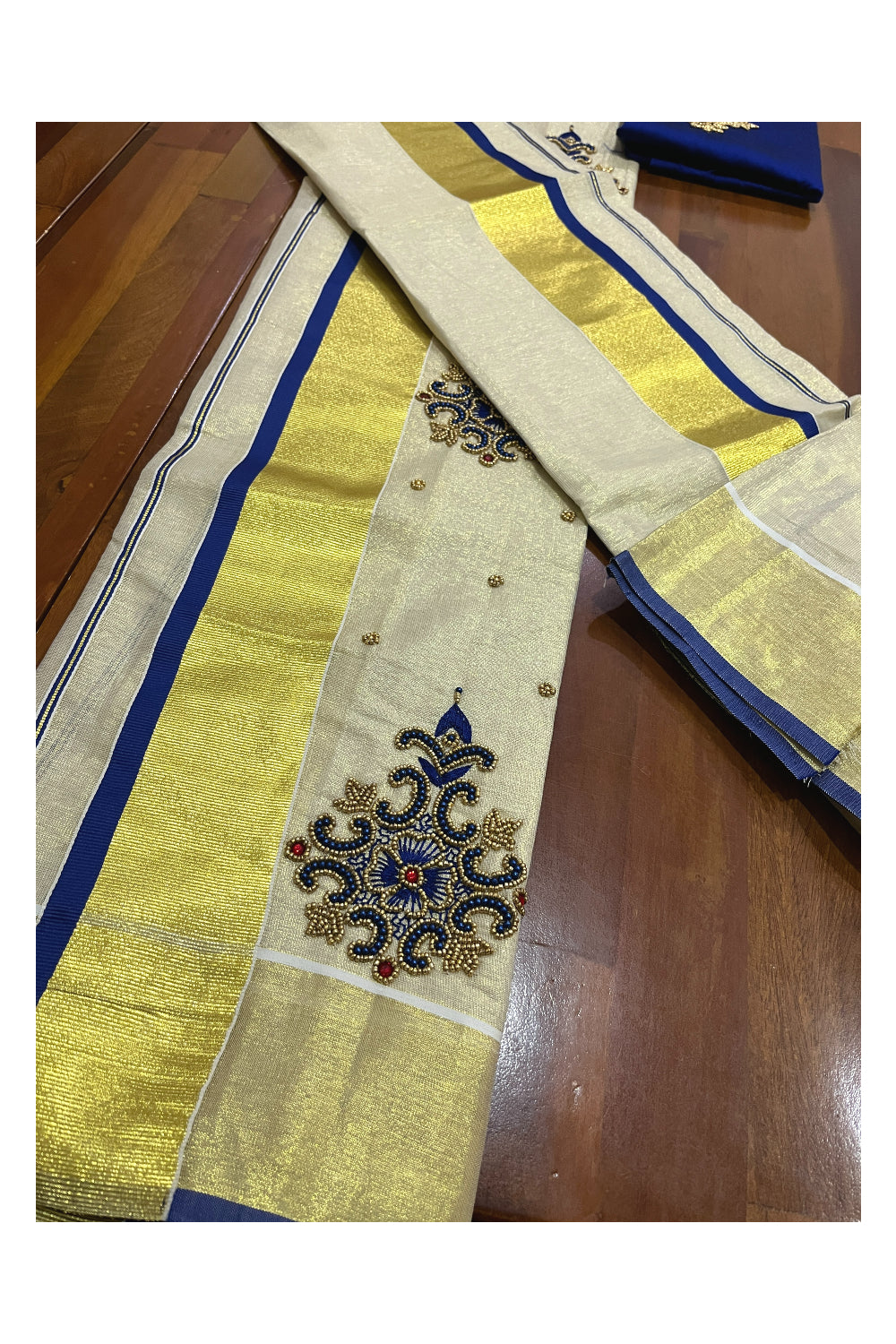 Kerala Tissue Kasavu Set Mundu (Mundum Neriyathum) with Bead Handwork Design and Blue Blouse Piece