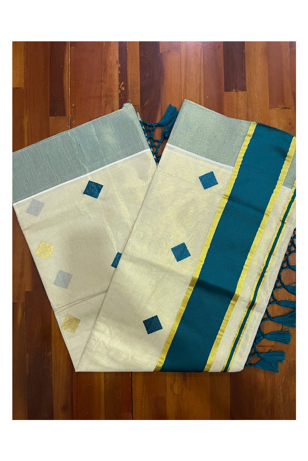 Kerala Tissue Kasavu Saree with Green Woven Butta Designs and Tassels Works