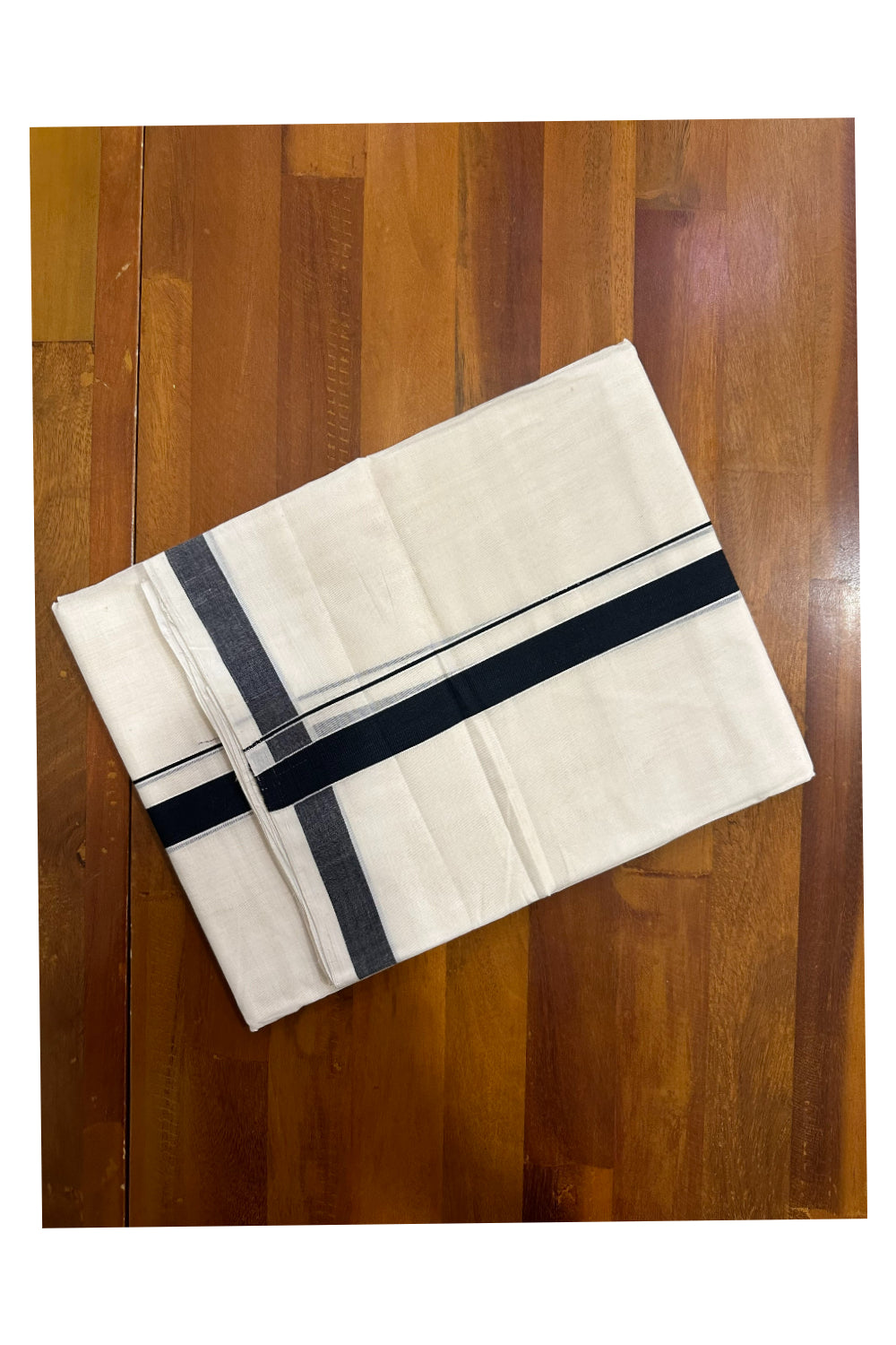 Southloom Premium Handloom Mundu with Black Kara (Onam Mundu 2023)