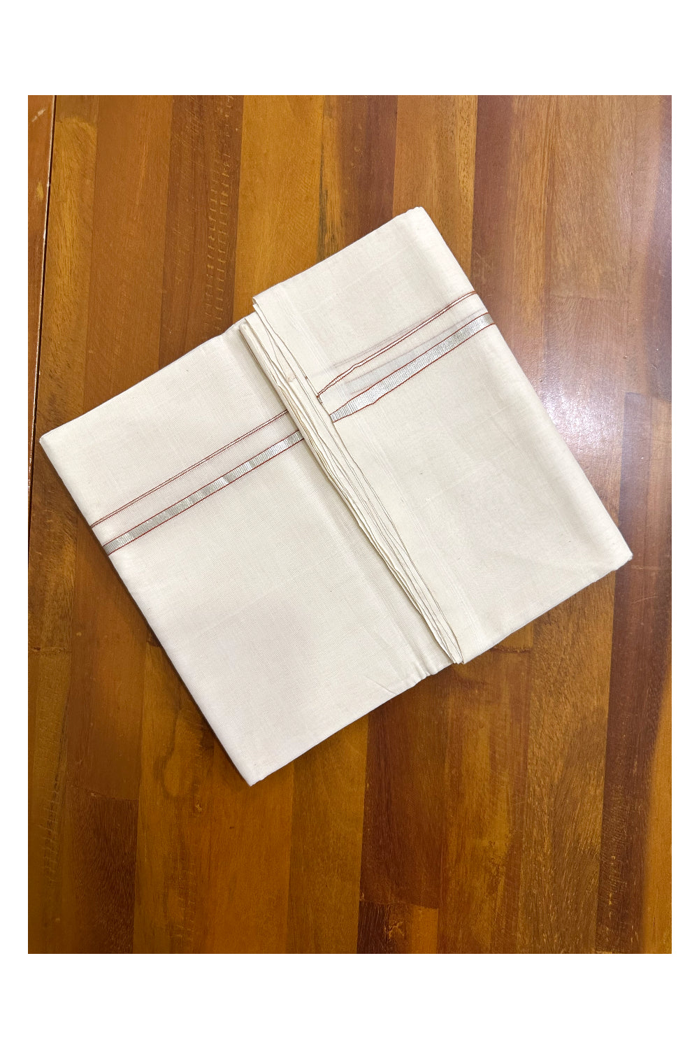 Premium Balaramapuram Handloom Unakkupaavu 0.5 inch Double Mundu with Silver Kasavu and Saffron Kara