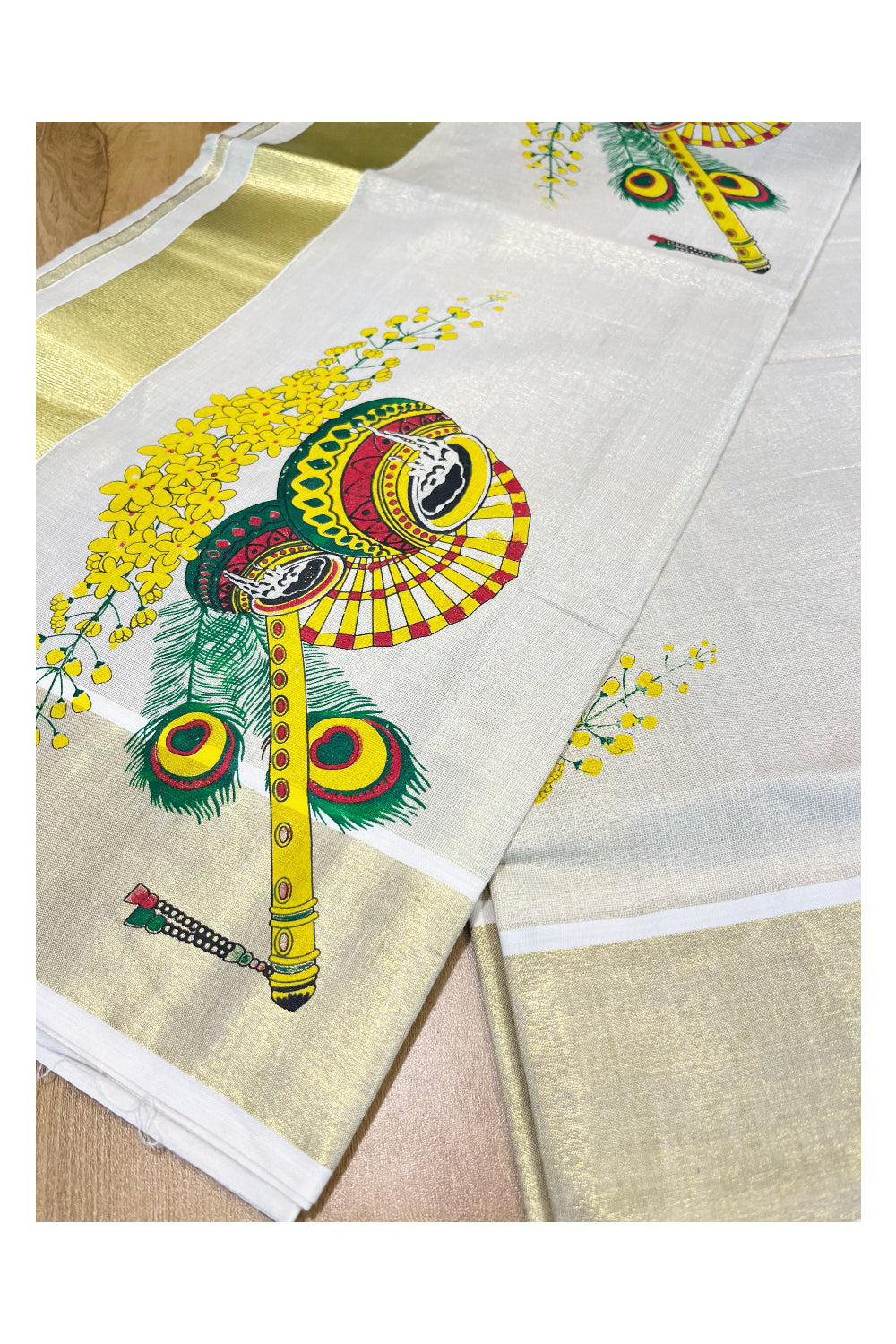 Kerala Tissue Kasavu Saree with Peacock Feather and Flute Mural Printed Designs