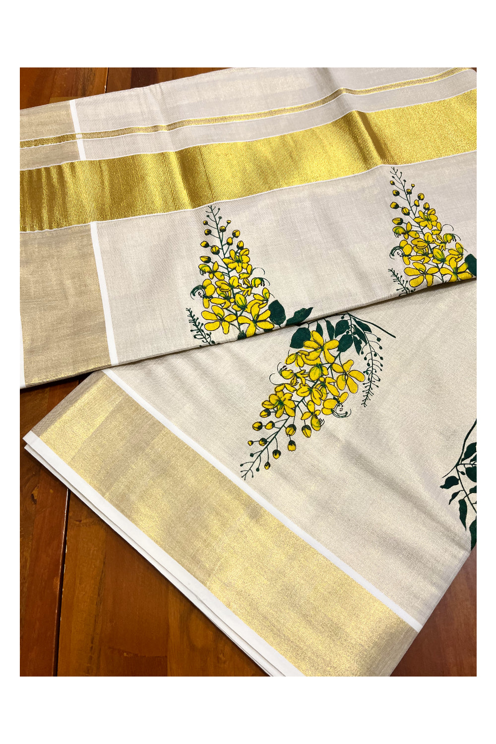 Kerala Tissue Kasavu Saree with Floral Prints on Body