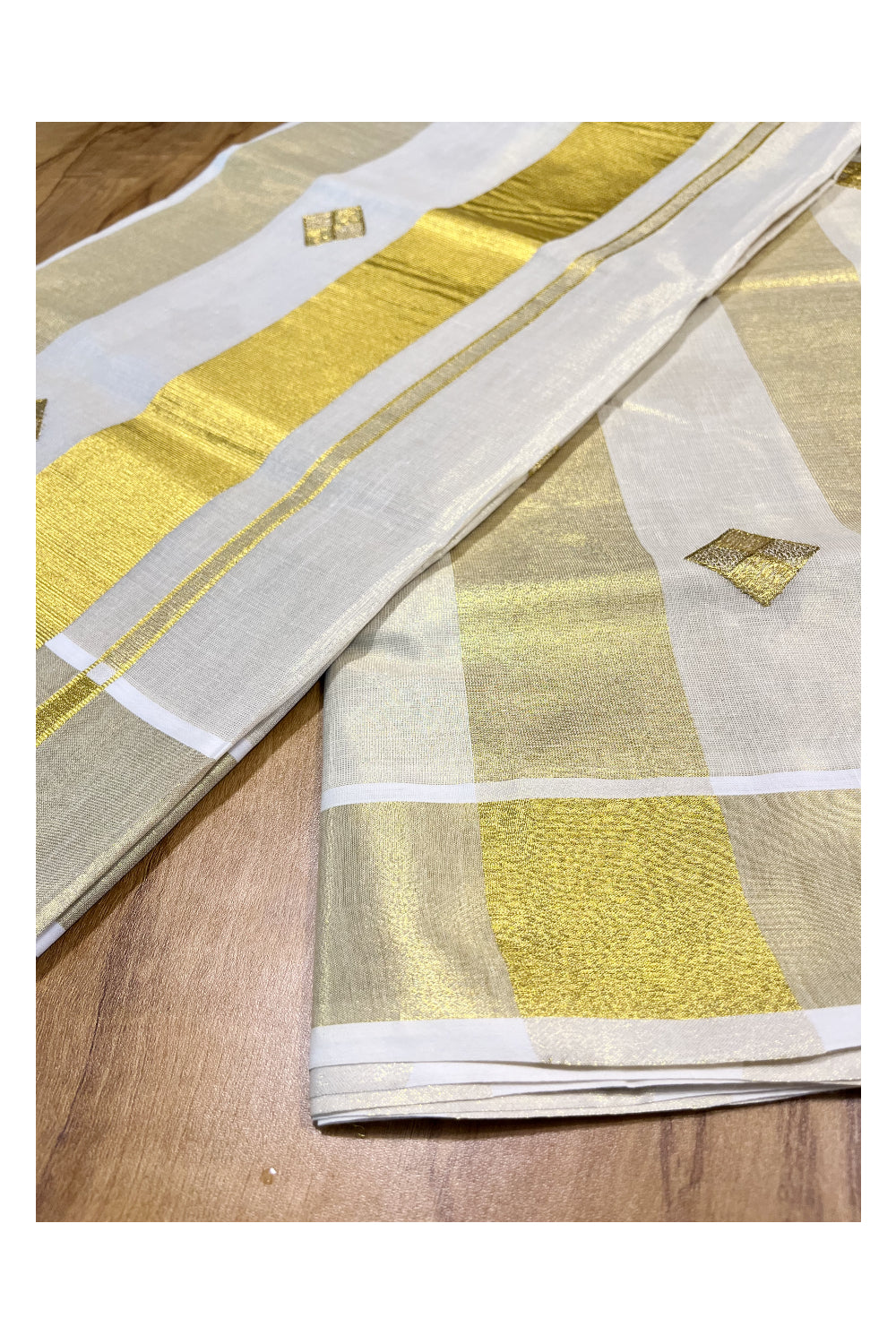 Kerala Tissue Kasavu Lines Saree with Golden Diagonal Woven Embroidery Designs on Body and Pallu