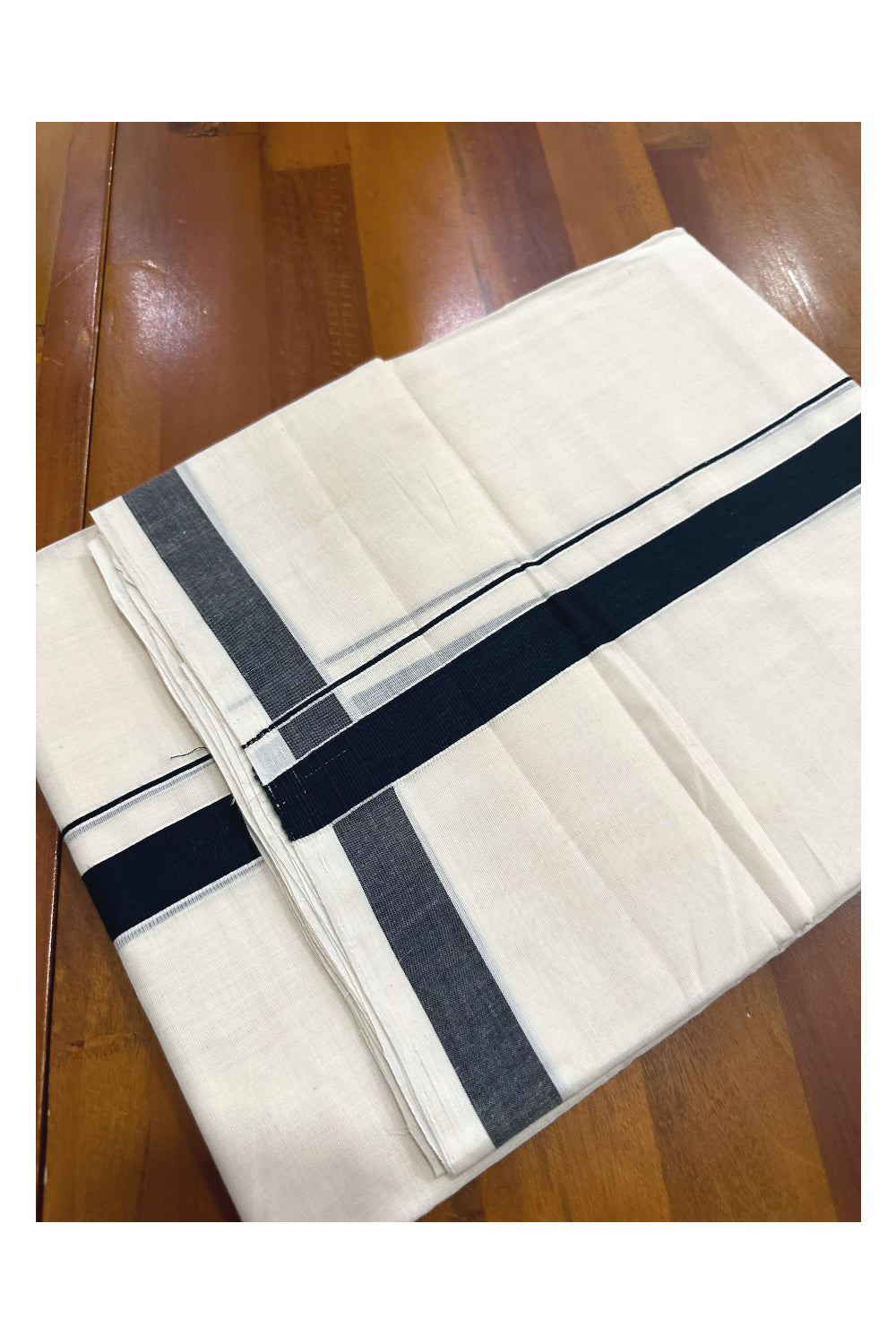 Southloom Premium Handloom Mundu with Black Kara (Onam Mundu 2023)