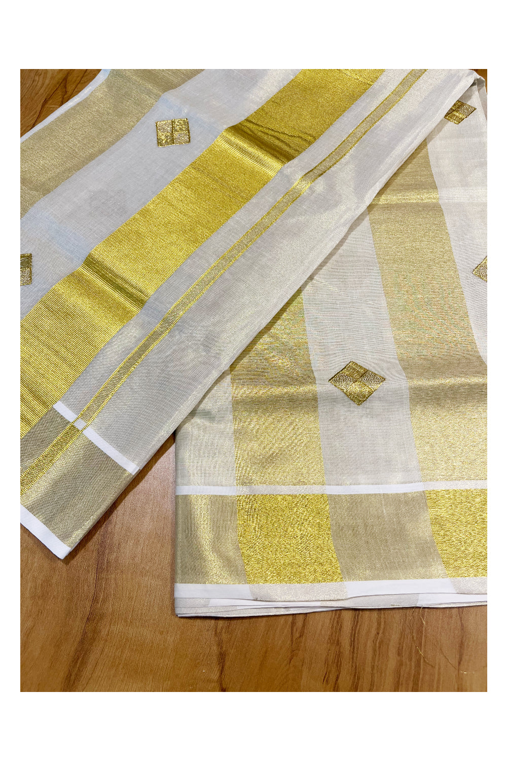 Kerala Tissue Kasavu Lines Saree with Golden Diagonal Woven Embroidery Designs on Body and Pallu