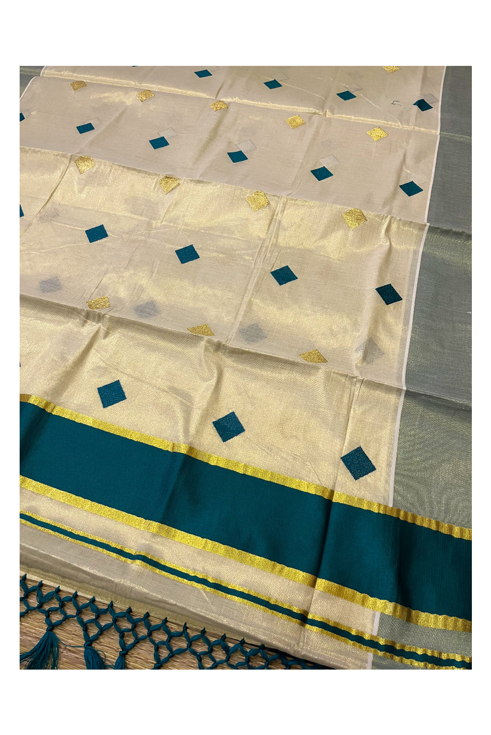 Kerala Tissue Kasavu Saree with Green Woven Butta Designs and Tassels Works