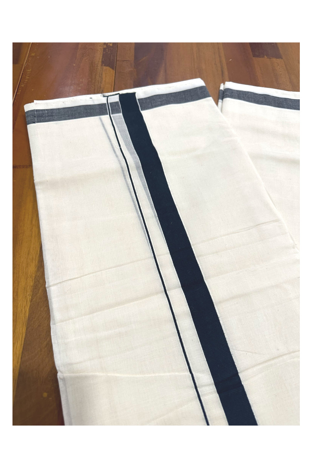 Southloom Premium Handloom Mundu with Black Kara (Onam Mundu 2023)