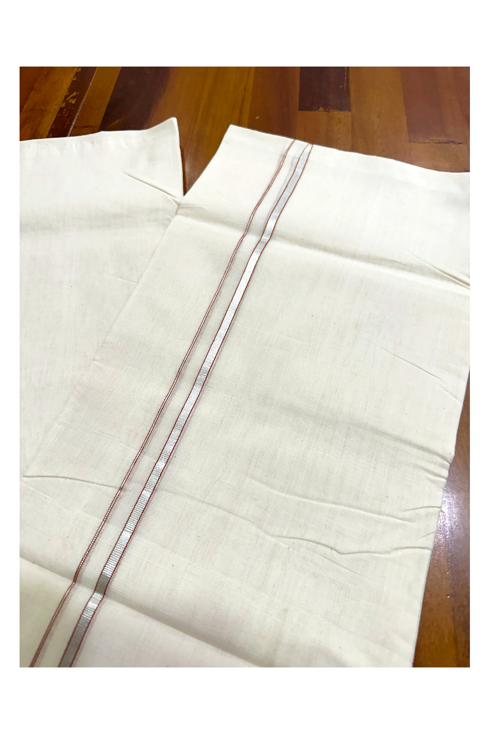 Premium Balaramapuram Handloom Unakkupaavu 0.5 inch Double Mundu with Silver Kasavu and Saffron Kara