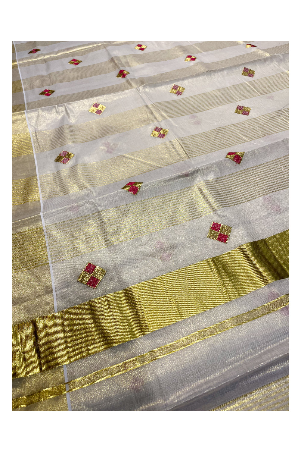 Kerala Tissue Kasavu Stripes Saree with Pink and Golden Diagonal Floral Embroidery Design on Body