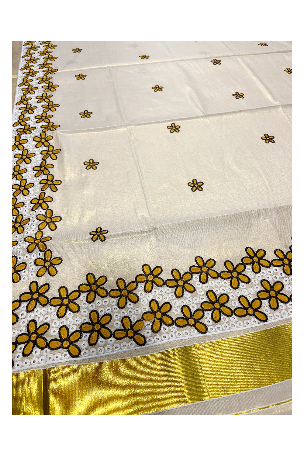 Kerala Tissue Kasavu Saree with Yellow Floral Embroidery Works