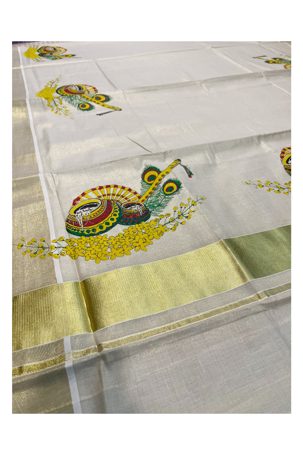 Kerala Tissue Kasavu Saree with Peacock Feather and Flute Mural Printed Designs