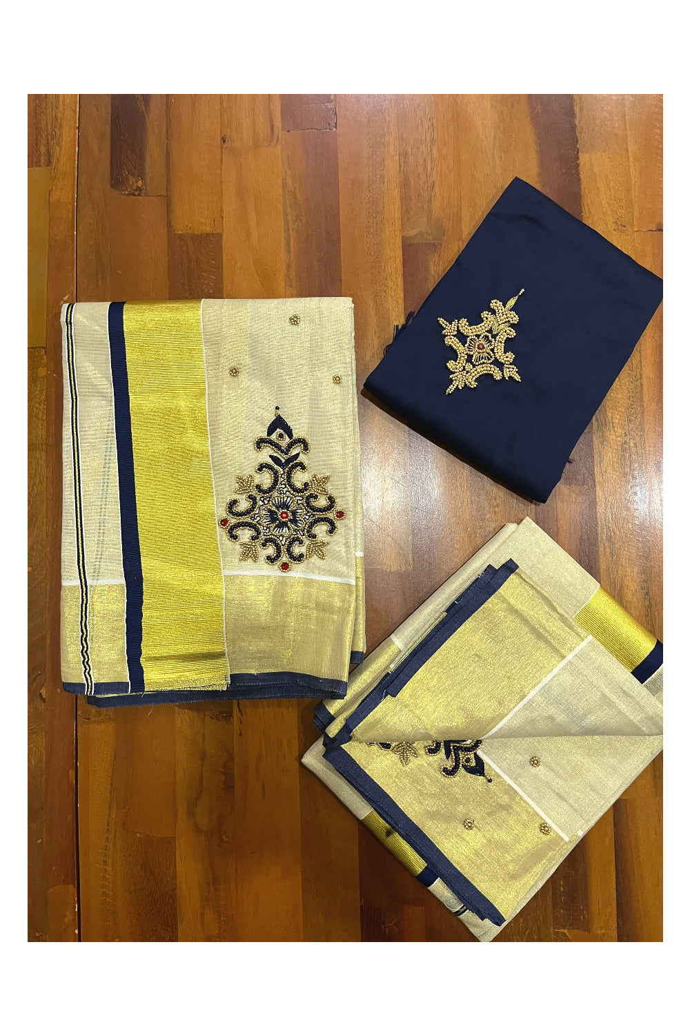 Kerala Tissue Kasavu Set Mundu (Mundum Neriyathum) with Handwork Design and Dark Blue Blouse Piece