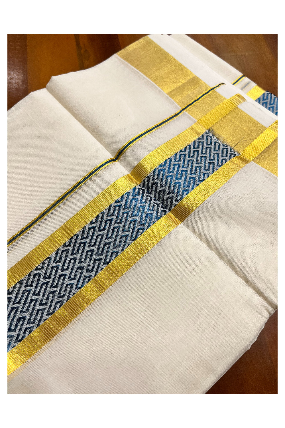 Southloom Premium Handloom Pure Cotton Mundu with Golden and Blue Kasavu Woven Border (Vishu 2024 Collection)