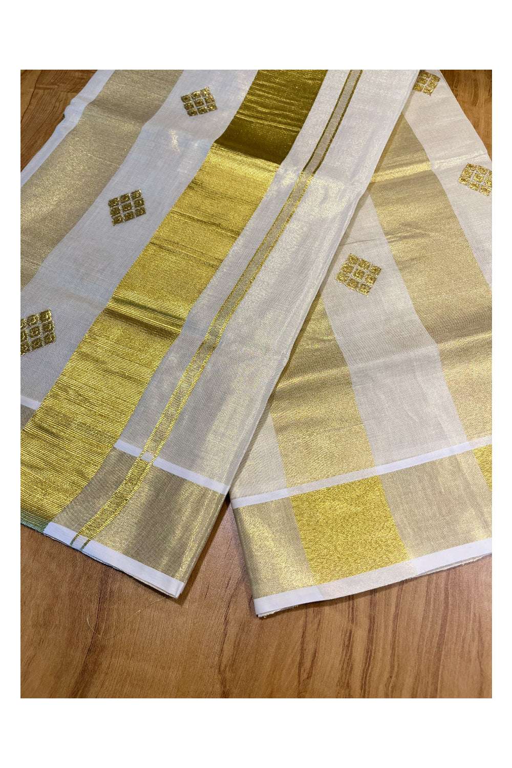 Kerala Tissue Kasavu Stripes Saree with Golden Embroidery Designs on Body and Pallu