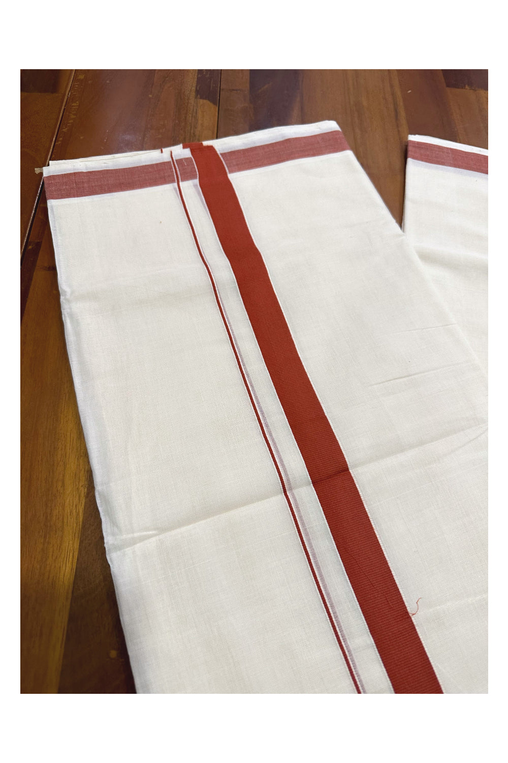 Southloom Premium Handloom Mundu with Dark Orange Kara (Onam Mundu 2023)