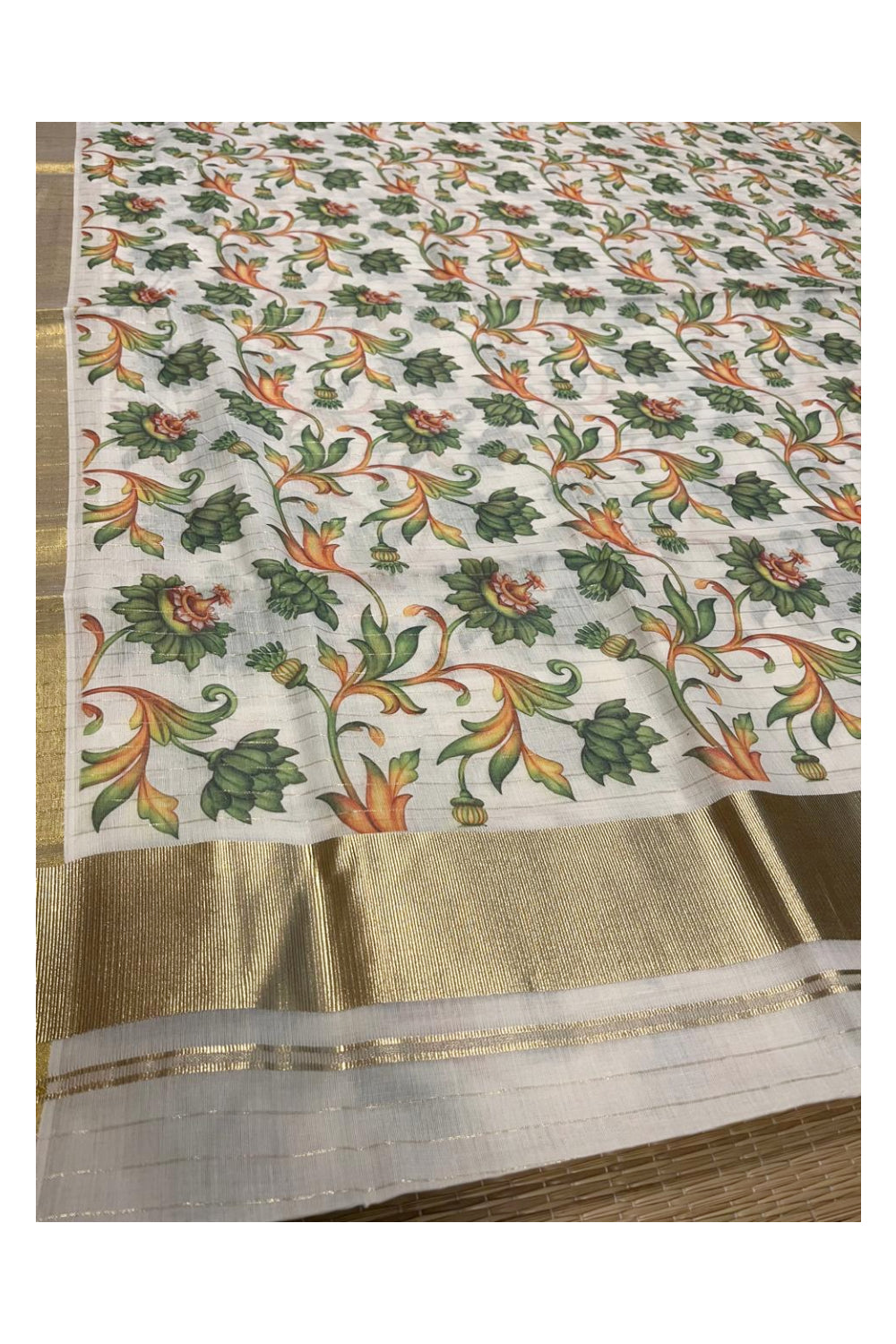 Kerala Cotton Kasavu Lines Saree with Green Floral Kalamkari Design