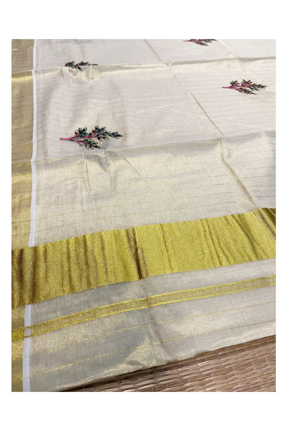 Kerala Tissue Kasavu Lines Saree with Green and Pink Floral Embroidery Works