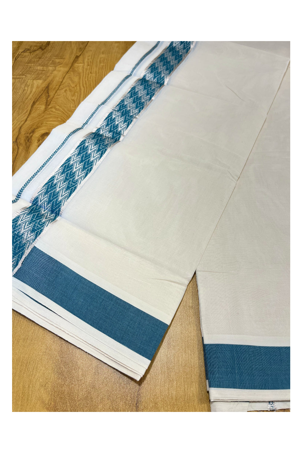 Southloom Off White Cotton Double Mundu with Silver Kasavu and Peacock Green Woven Border