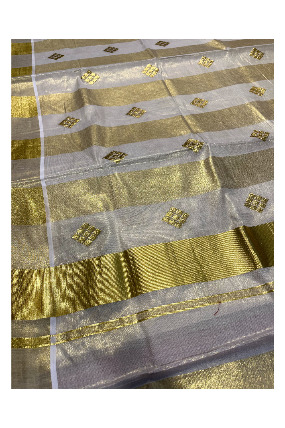 Kerala Tissue Kasavu Stripes Saree with Golden Embroidery Designs on Body and Pallu