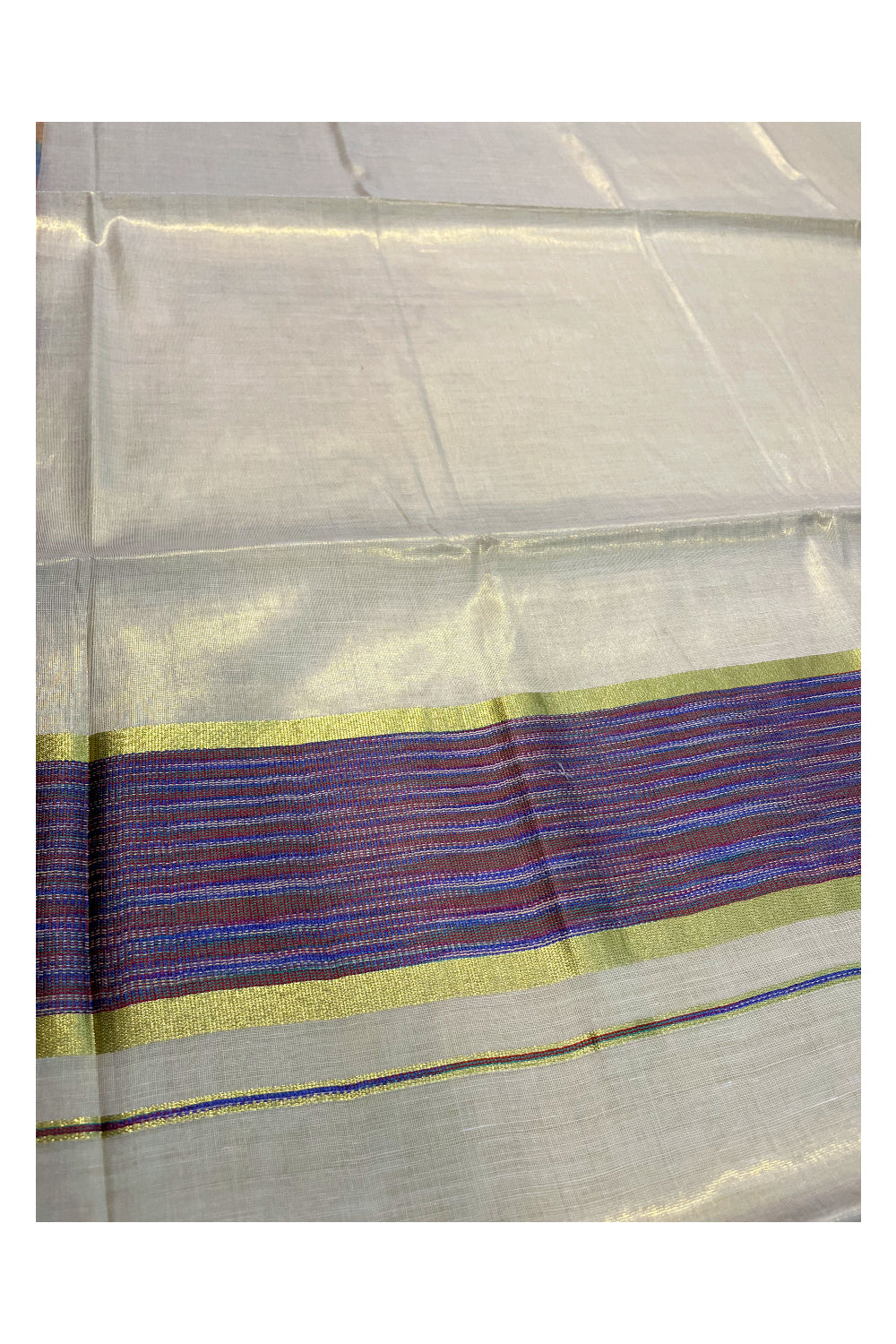 Southloom Kerala Tissue Kasavu Saree with Multi Colour Pochampally Design on Borders and Kara