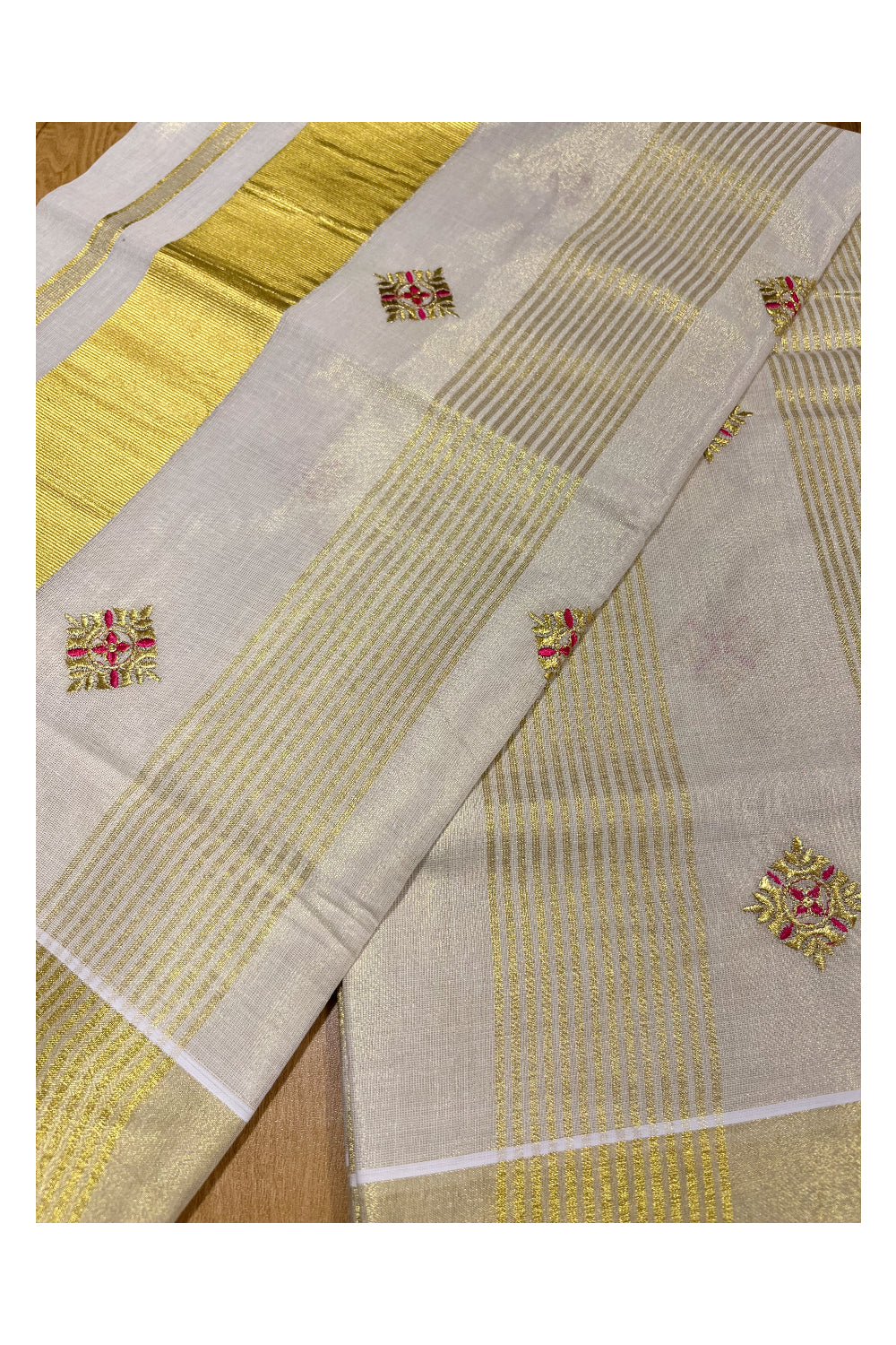 Kerala Tissue Kasavu Stripes Saree with Pink Floral Embroidery Design on Body