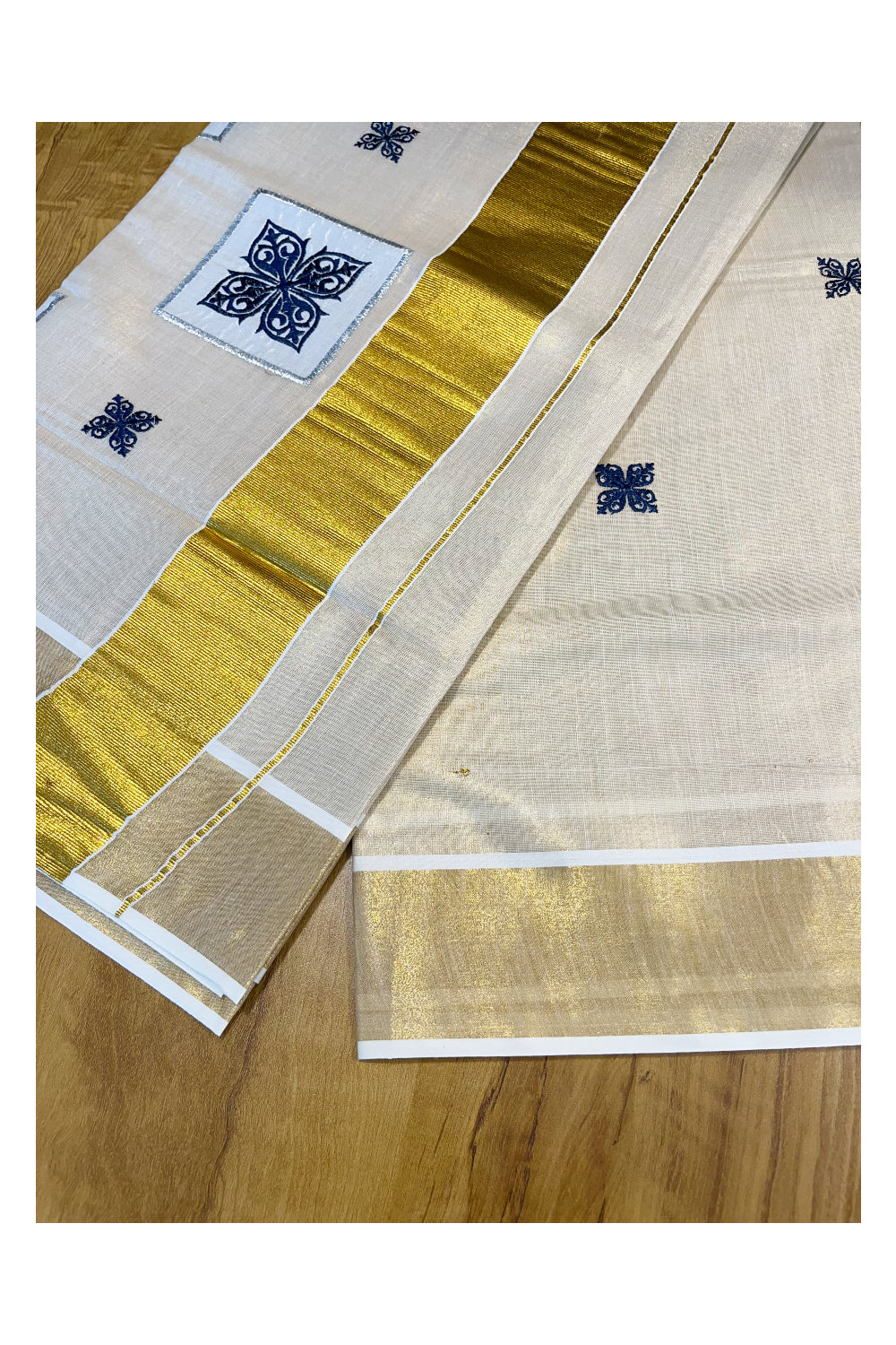 Southloom Kerala Tissue Kasavu Saree with Blue Appliq Work