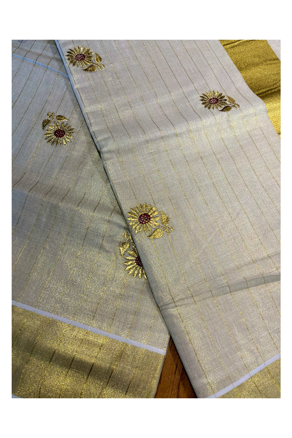 Kerala Tissue Kasavu Lines Saree with Embroidary Work On Body