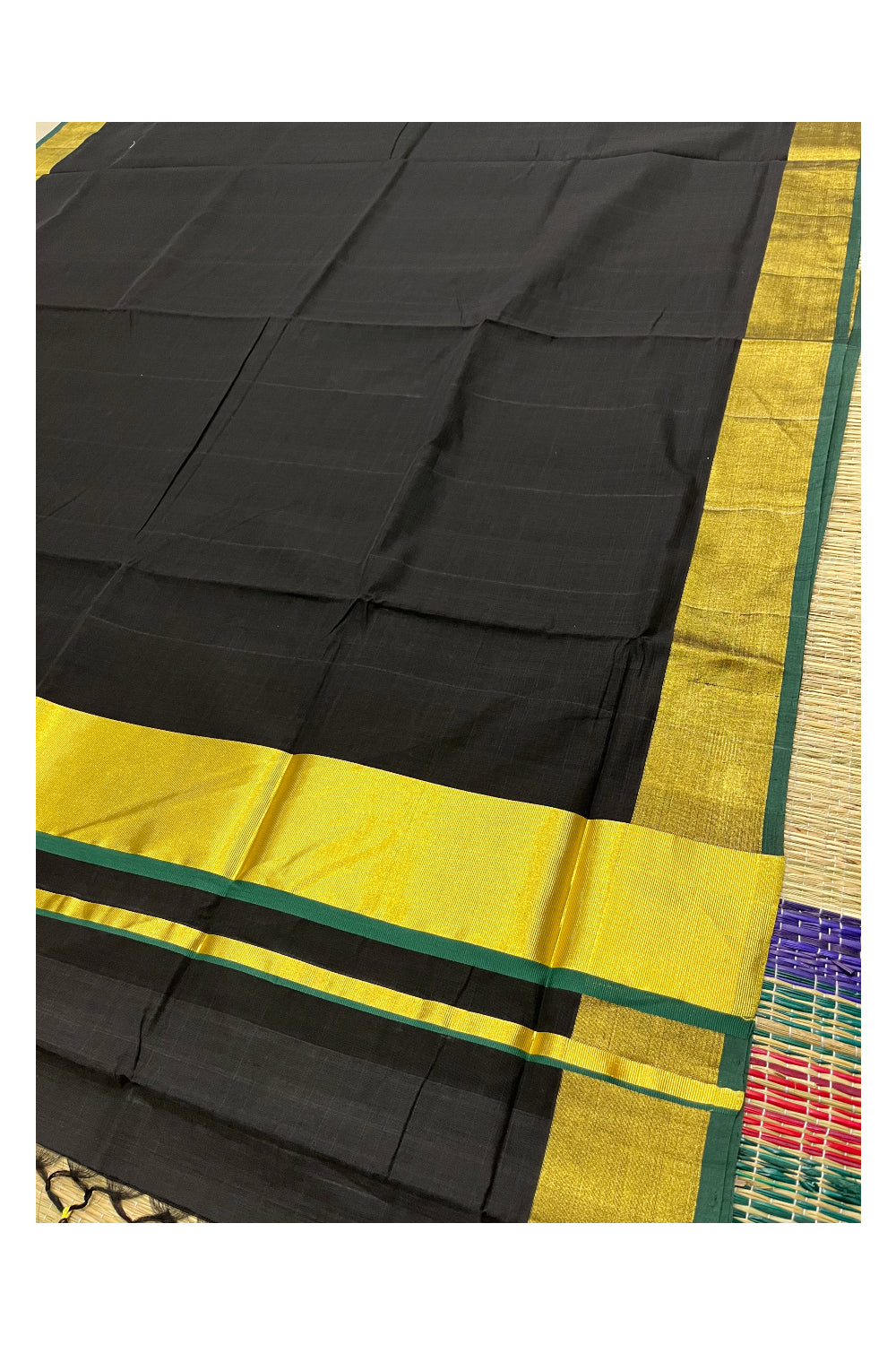 Southloom Premium Handloom Black Saree with Green And Kasavu Border