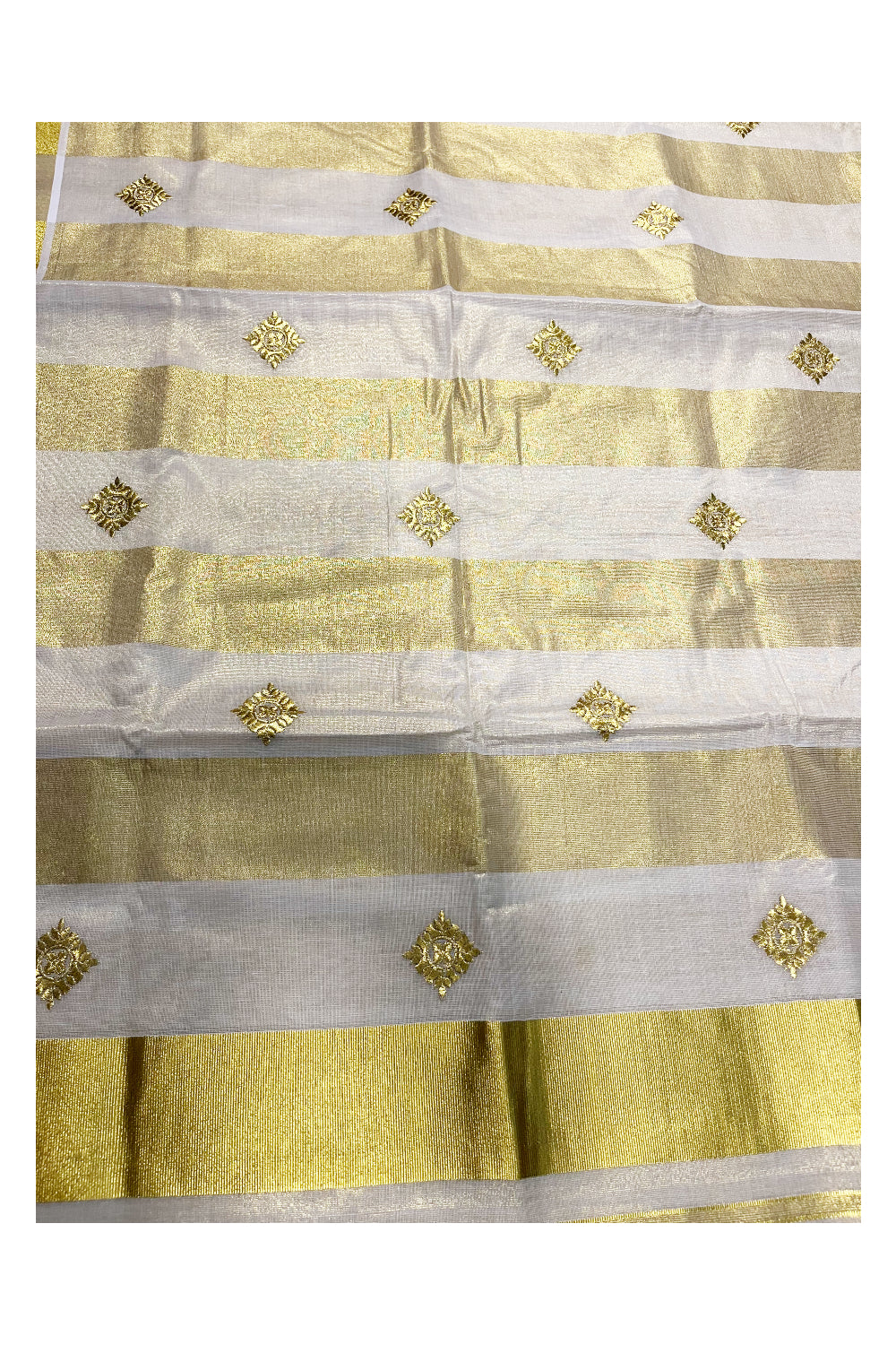 Kerala Tissue Kasavu Stripes Saree with Golden Floral Embroidery Designs on Body and Pallu