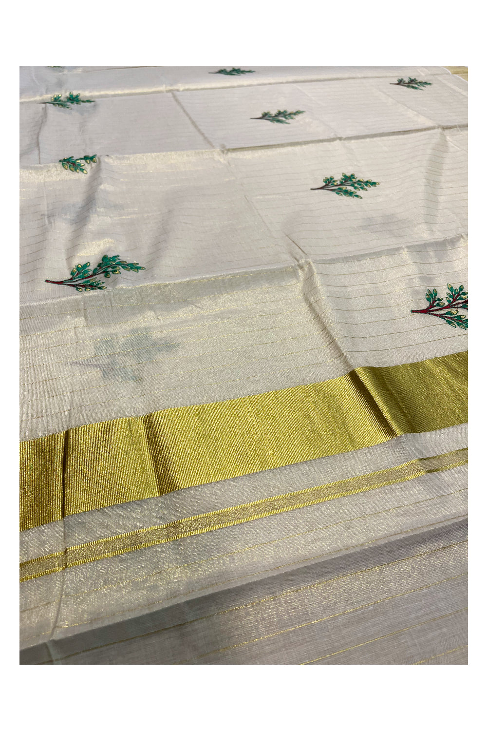 Kerala Tissue Kasavu Lines Saree with Green and Brown Floral Embroidery Works