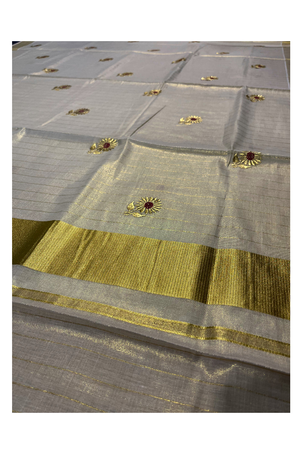 Kerala Tissue Kasavu Lines Saree with Embroidary Work On Body