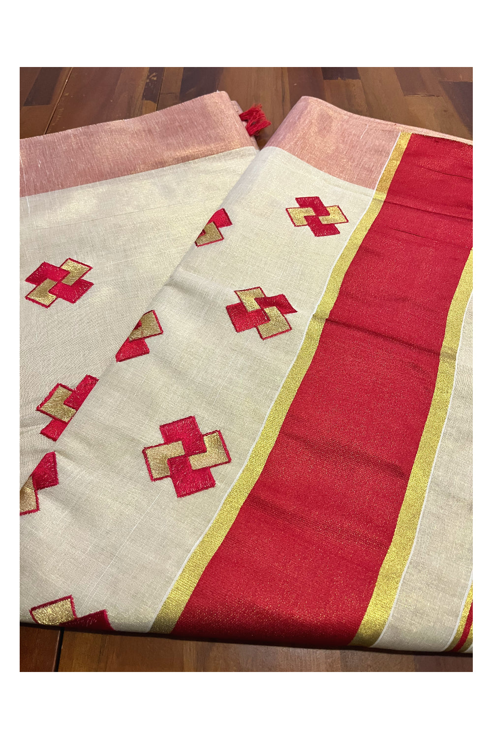 Kerala Tissue Kasavu Saree With Red Border and Embroidered Designs on Body