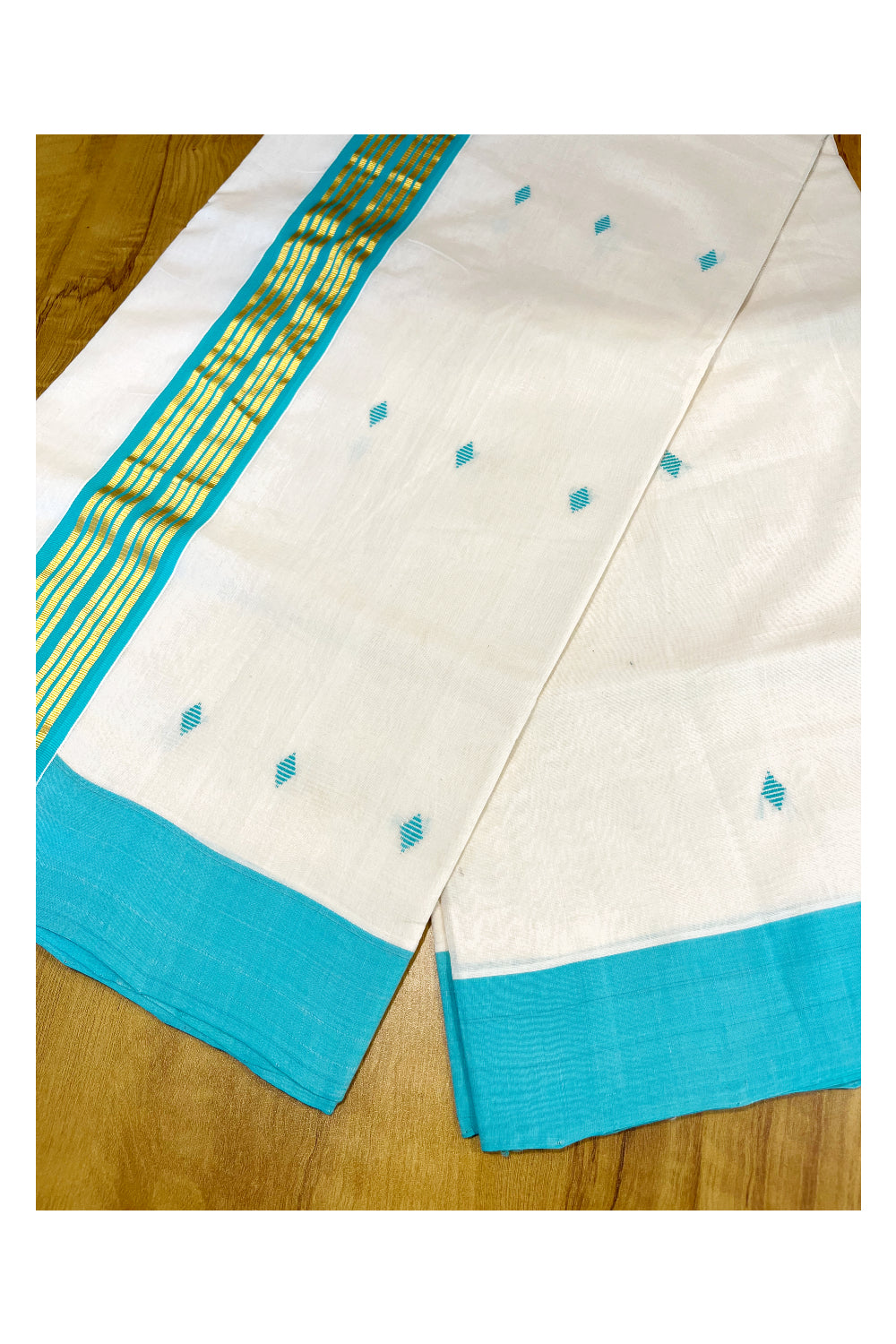 Southloom Premium Balaramapuram Unakkupaavu Handloom Cotton Butta Saree with Blue and Kasavu Border