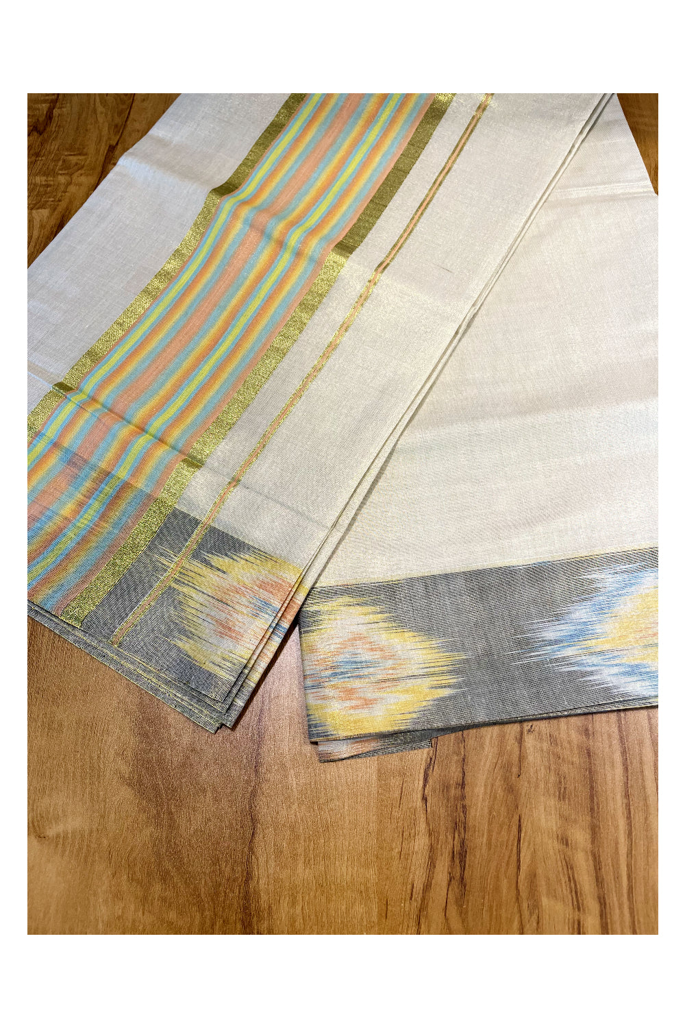 Southloom Kerala Tissue Kasavu Saree with Multi Colour Pochampally Design on Borders and Kara