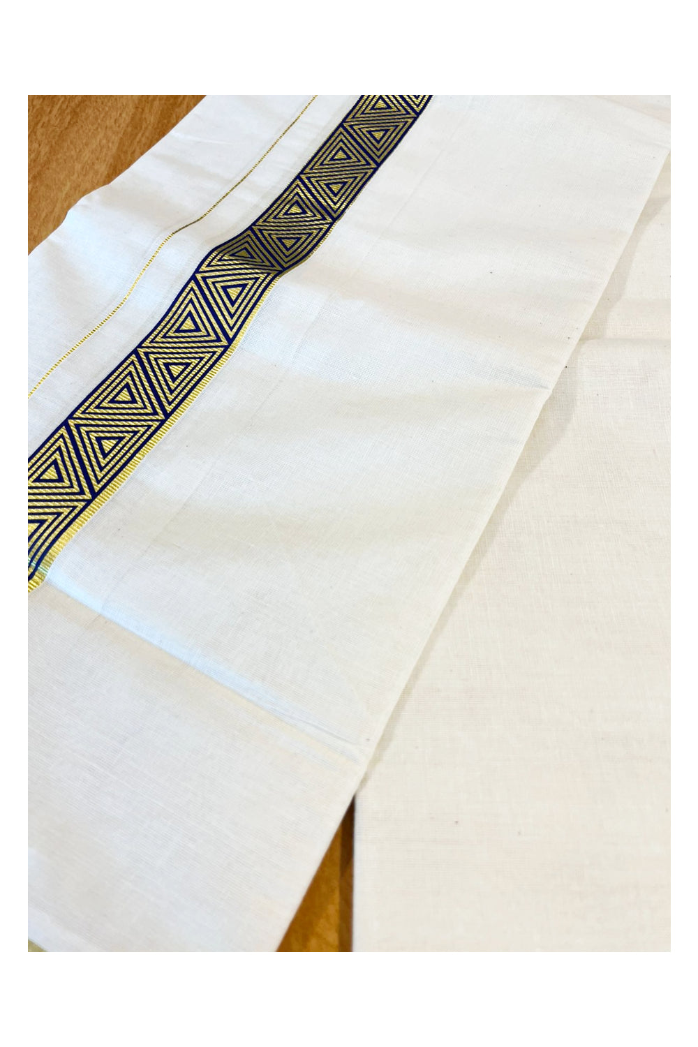 Southloom Kasavu Double Mundu with Blue Prints Along Kasavu Kara