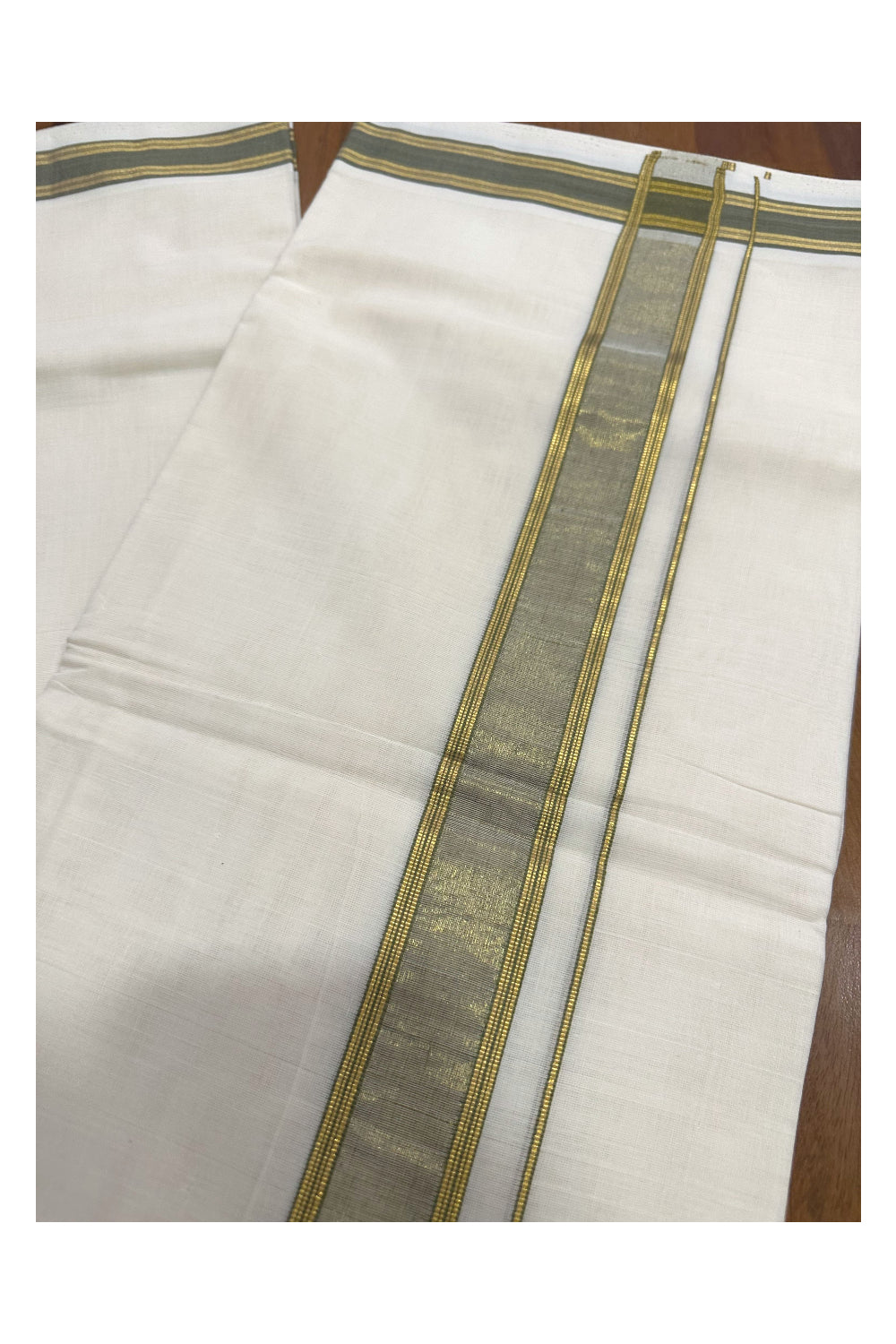 Southloom Premium Handloom Mundu with Green and Kasavu Kara (Onam Mundu 2023)