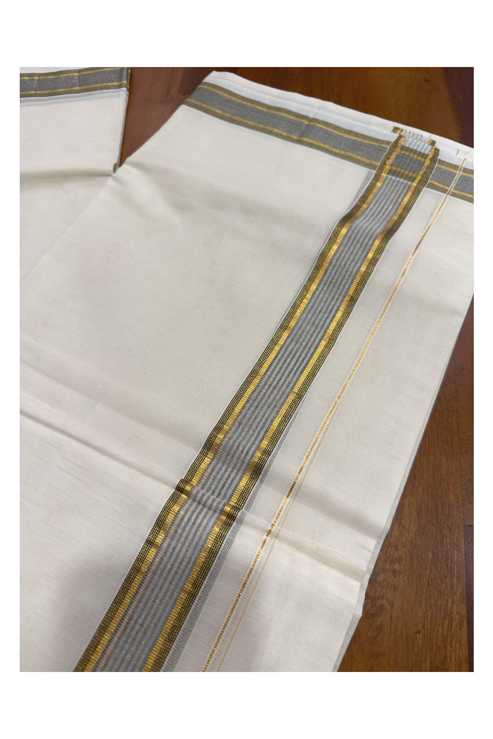 Southloom Premium Handloom Mundu with Green and Kasavu Kara (Onam Mundu 2023)