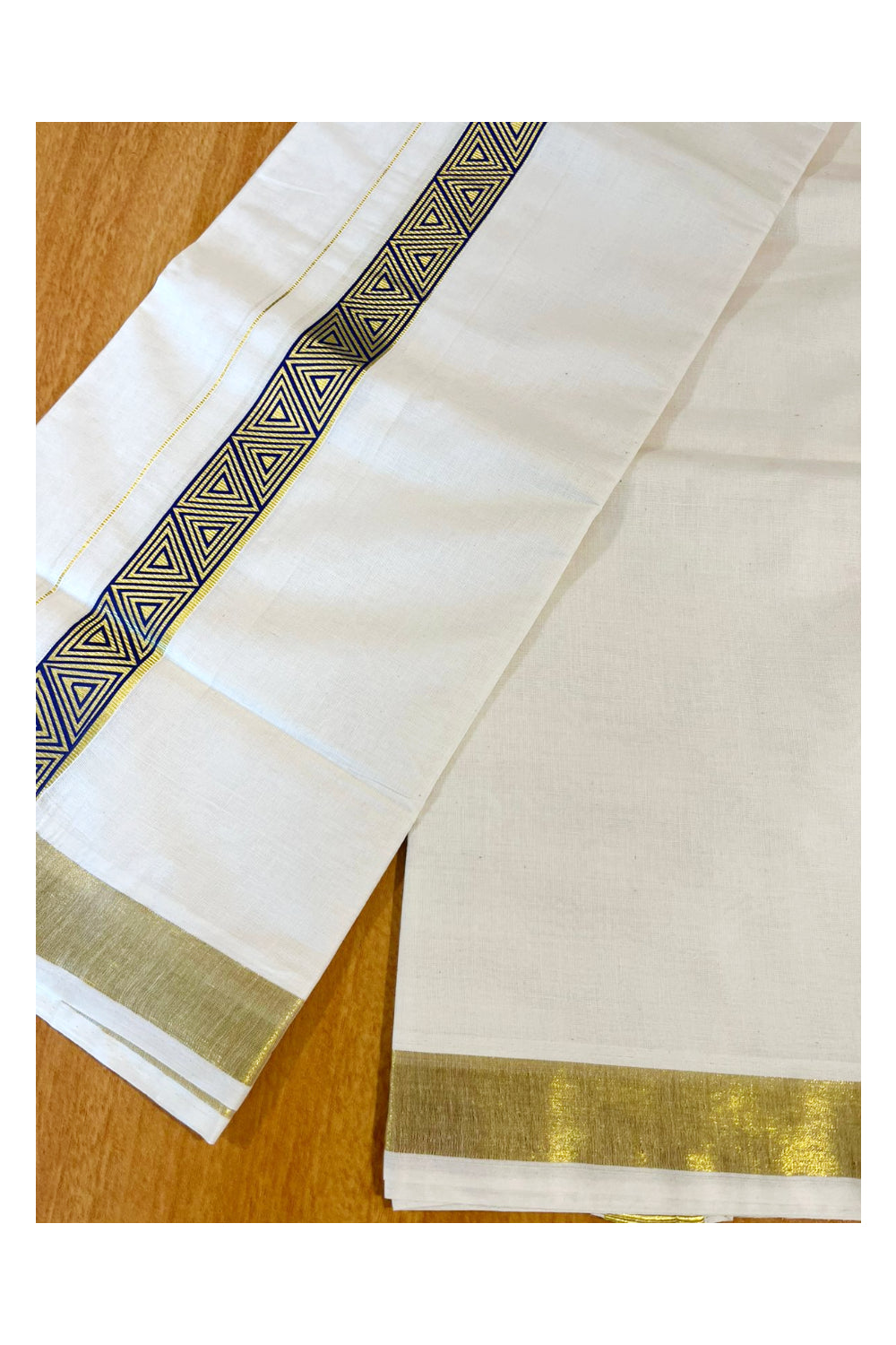 Southloom Kasavu Double Mundu with Blue Prints Along Kasavu Kara