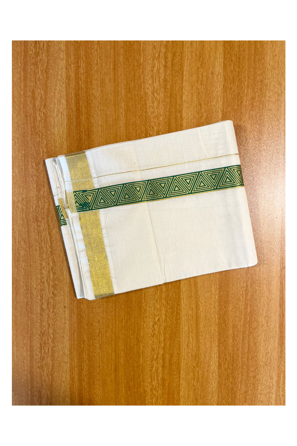 Southloom Kasavu Double Mundu with Green Prints Along Kasavu Kara