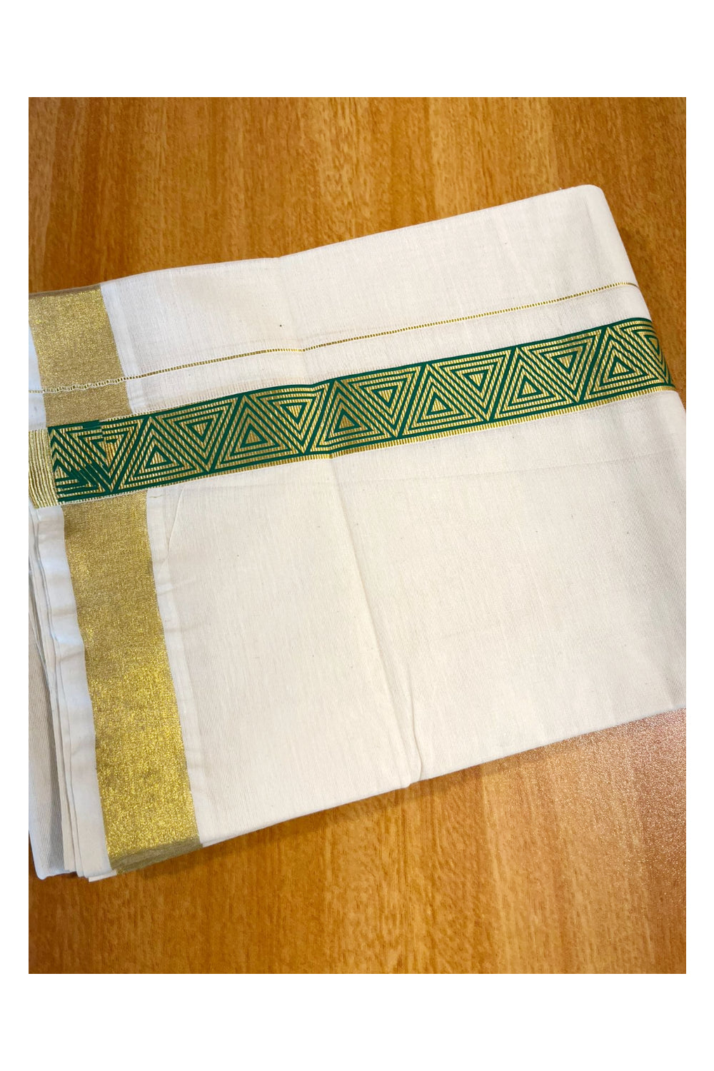 Southloom Kasavu Double Mundu with Green Prints Along Kasavu Kara