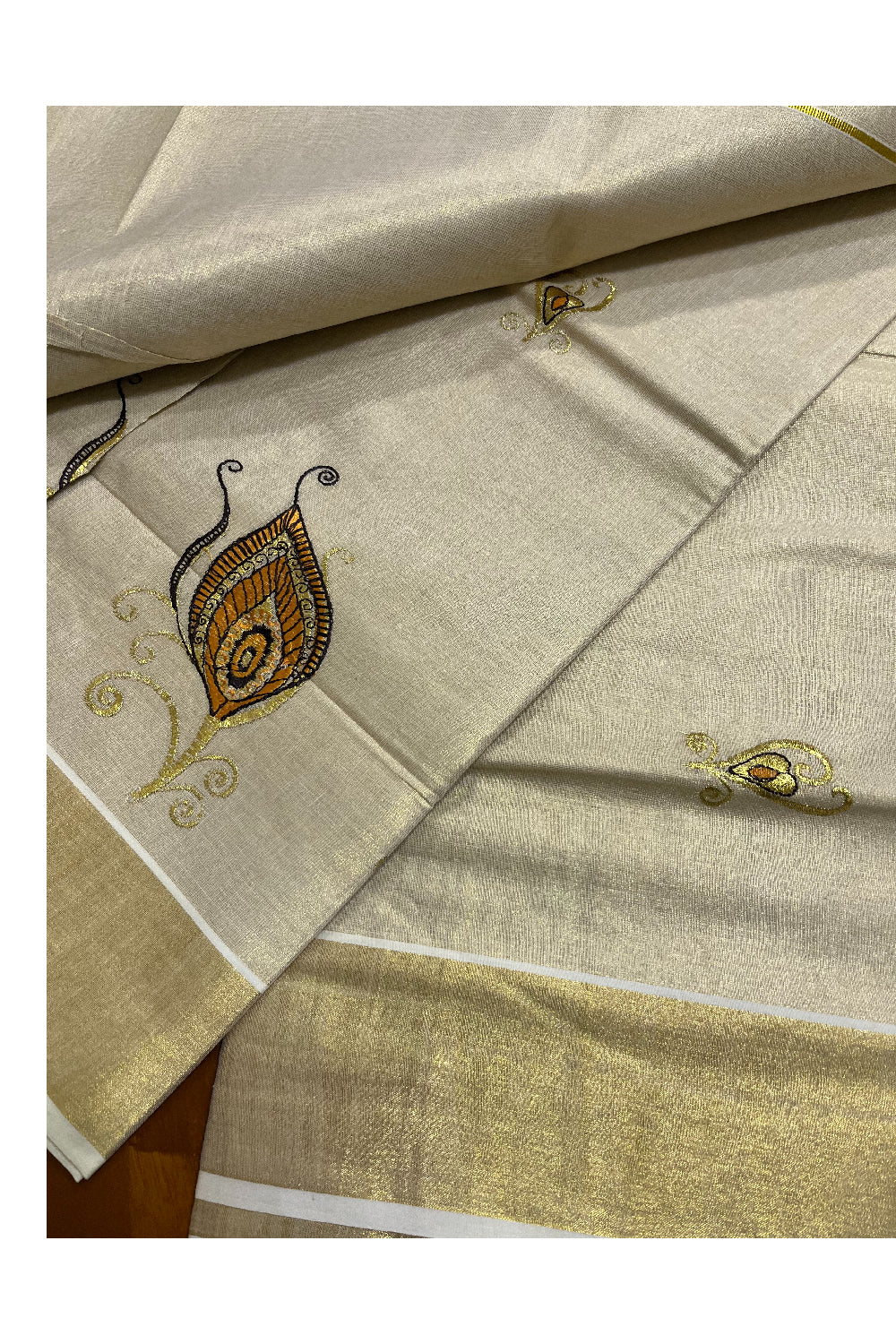Kerala Tissue Orange and Golden Feather Embroidery Work Kasavu Saree (Vishu 2024 Collection)