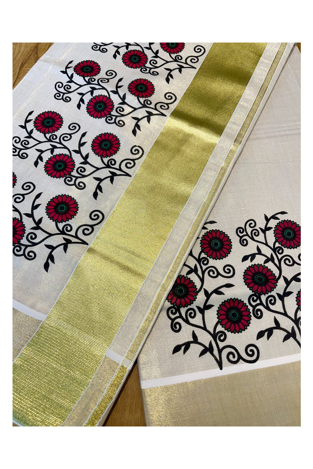 Kerala Tissue Kasavu Saree with Red And Black Floral Prints On Border