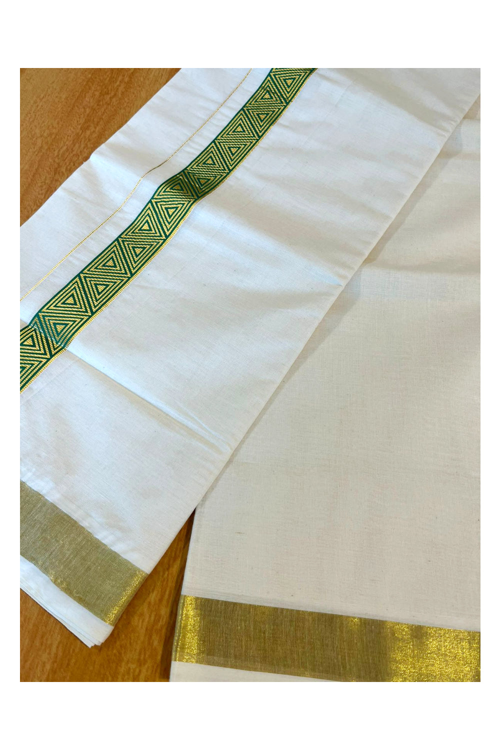 Southloom Kasavu Double Mundu with Green Prints Along Kasavu Kara